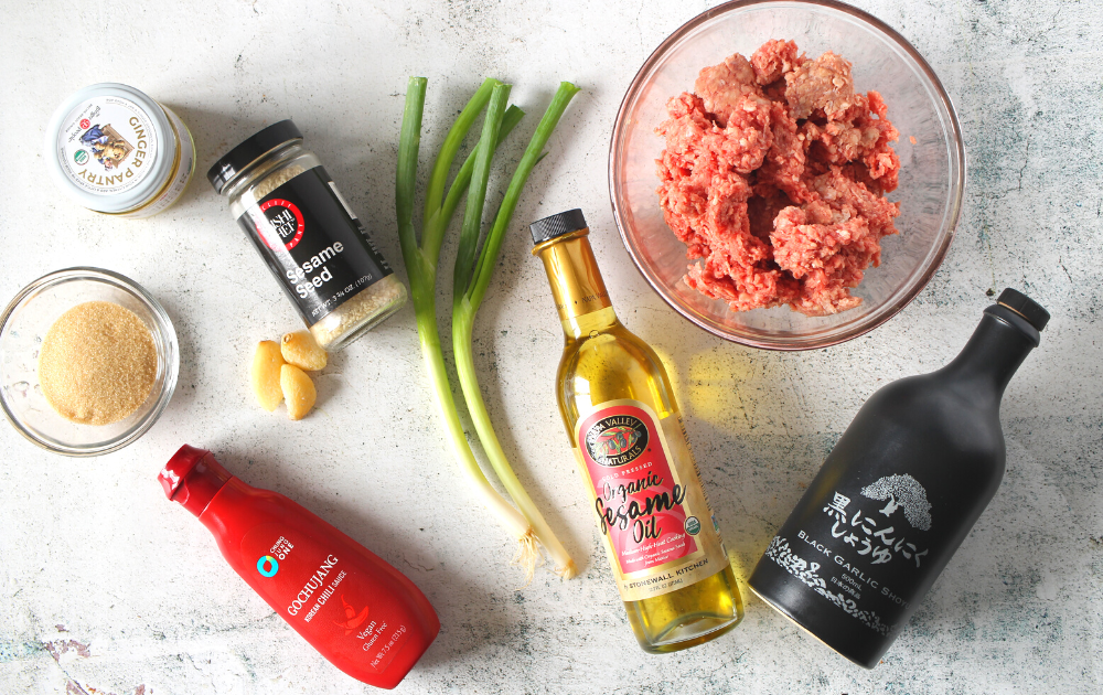 ingredients for making this easy Keto Korean ground beef recipe includes ground beef, soy sauce, ginger, scallions, sesame seeds and toasted sesame oil