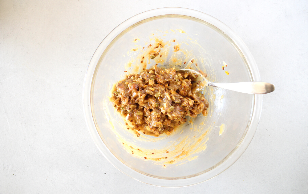 Instructions - Stir the keto granola and collagen peanut butter mixture together