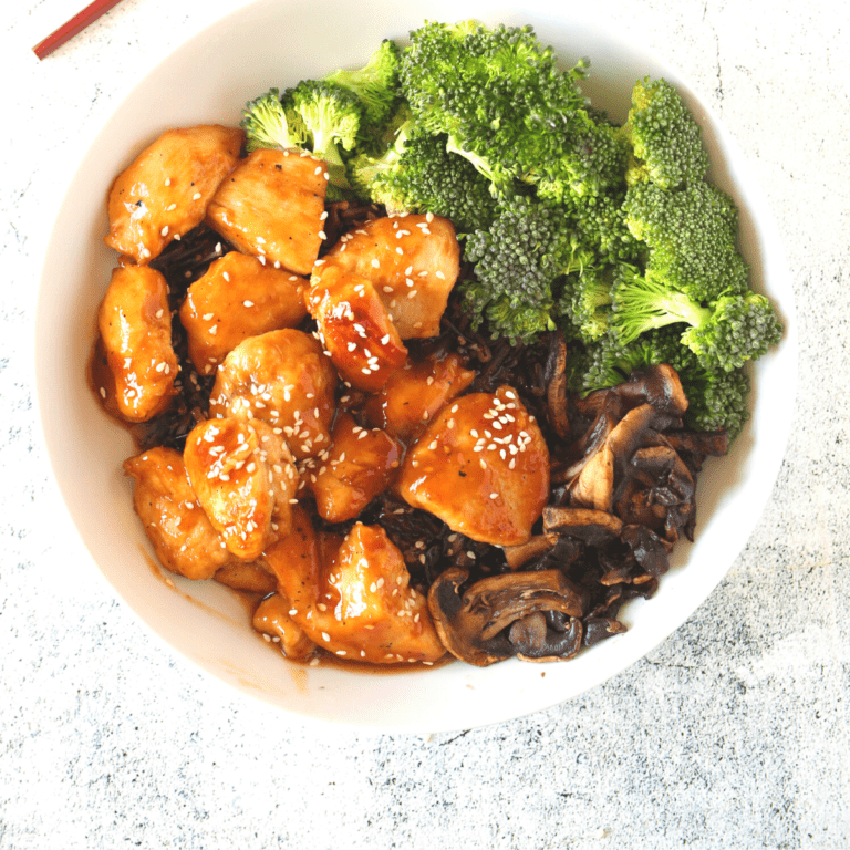 easy keto sesame chicken in a bowl with broccoli for a healthy keto dinner recipe idea
