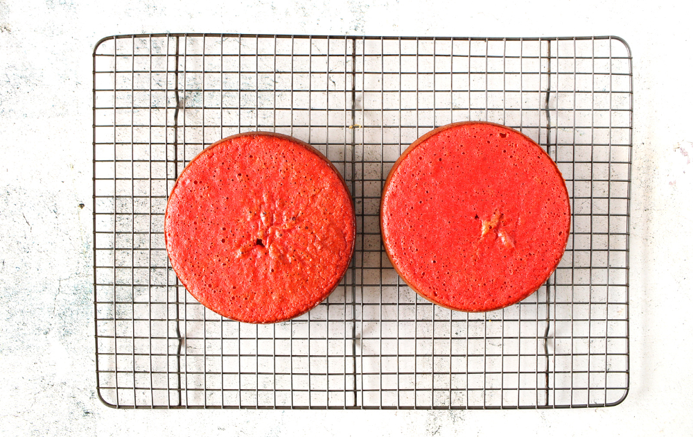Once baked, remove the cakes from the oven and allow them to cool slightly in their pan for 10 minutes before inverting them onto a cooling rack to cool completely.