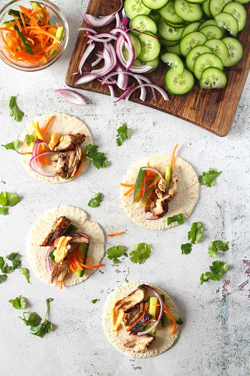 Cantonese keto bbq chicken served with keto pickled vegetables in keto taco shells