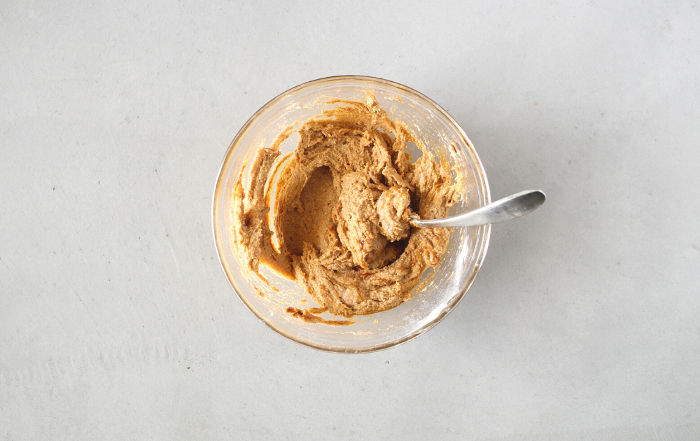 Remove ⅓rd of the mixture and place it in a separate bowl. Add the brown sugar and cinnamon to the mixture and mix until fully combined. This is going to be your cinnamon layer.