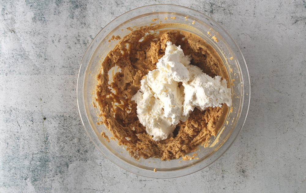 Fold some of the whipped cream into the peanut butter