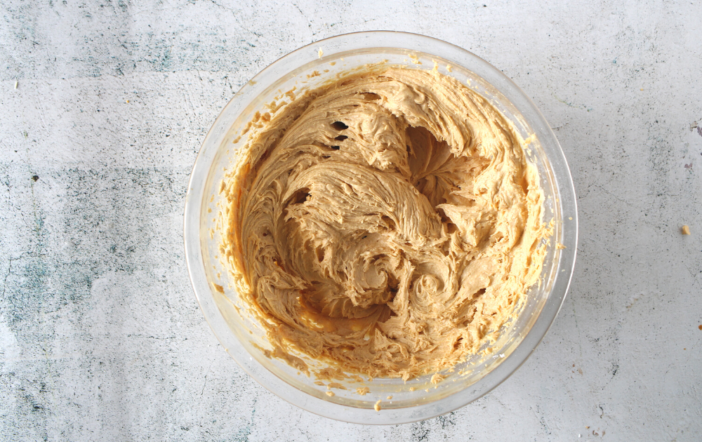 Beat the remaining ½ cup powdered allulose, cream cheese, peanut butter and butter until fluffy.