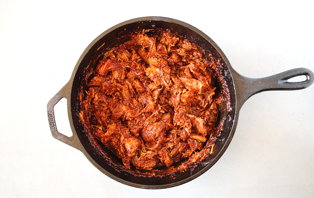 Remove from oven and let stand 5 minutes before shredding pork birria