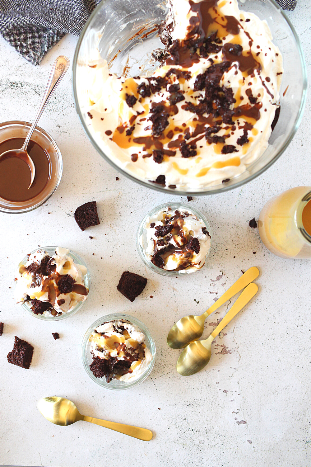 keto chocolate trifle with layers of gluten-free chocolate cake and sugar-free chocolate, caramel and whipped cream