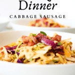 a white bowl filled with sauteed cabbage and sausage for a quick 15 minute keto dinner