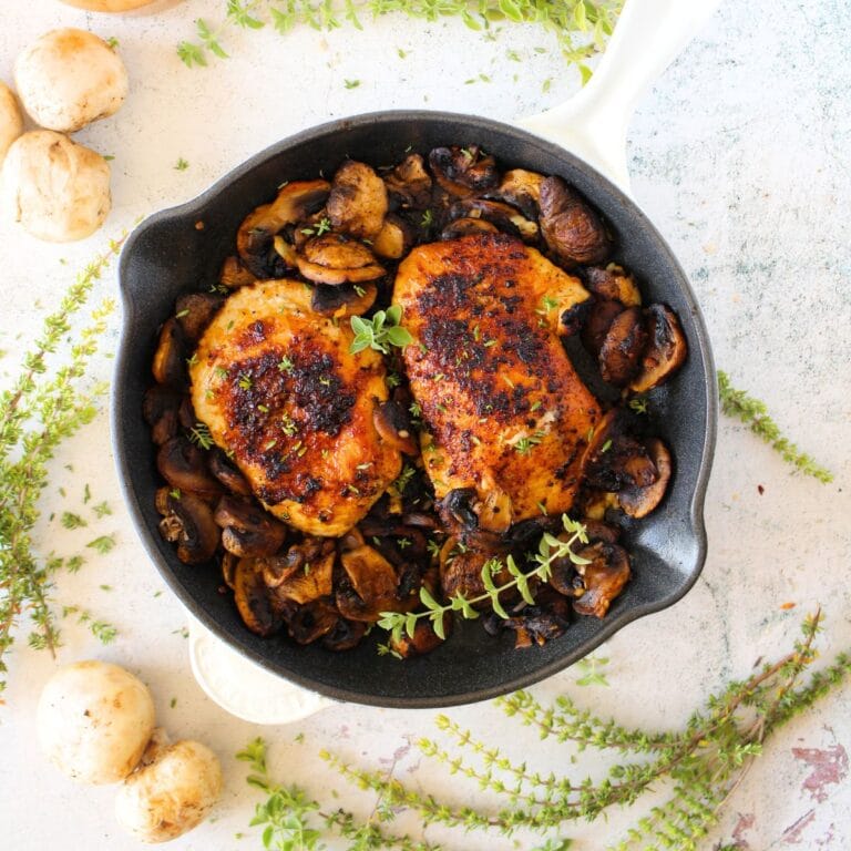 top view of 15-minute keto chicken garlic and mushroom dinner with herbs