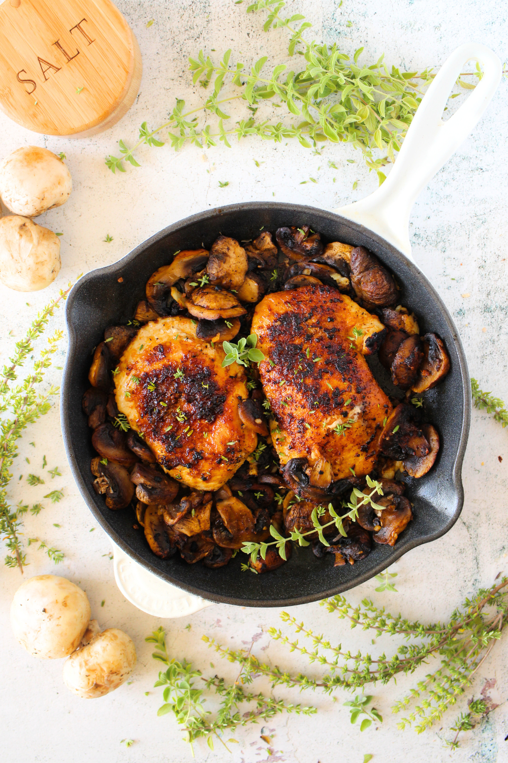 top view of 15-minute keto chicken garlic and mushroom dinner with herbs
