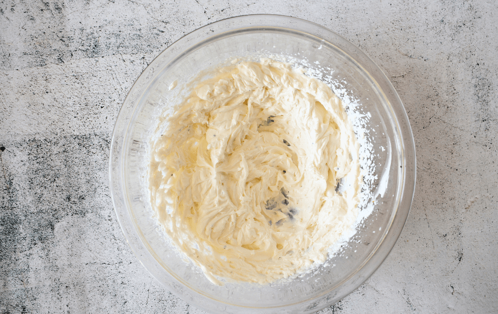 top view of a mixing bowl with keto whipped goat cheese