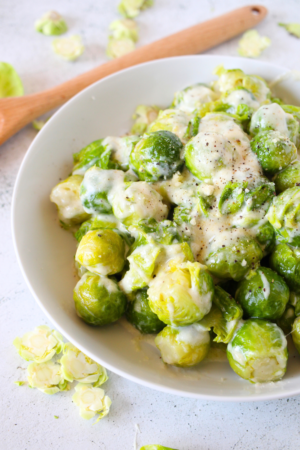 a keto vegetable side dish made with Brussels sprouts braised in cream