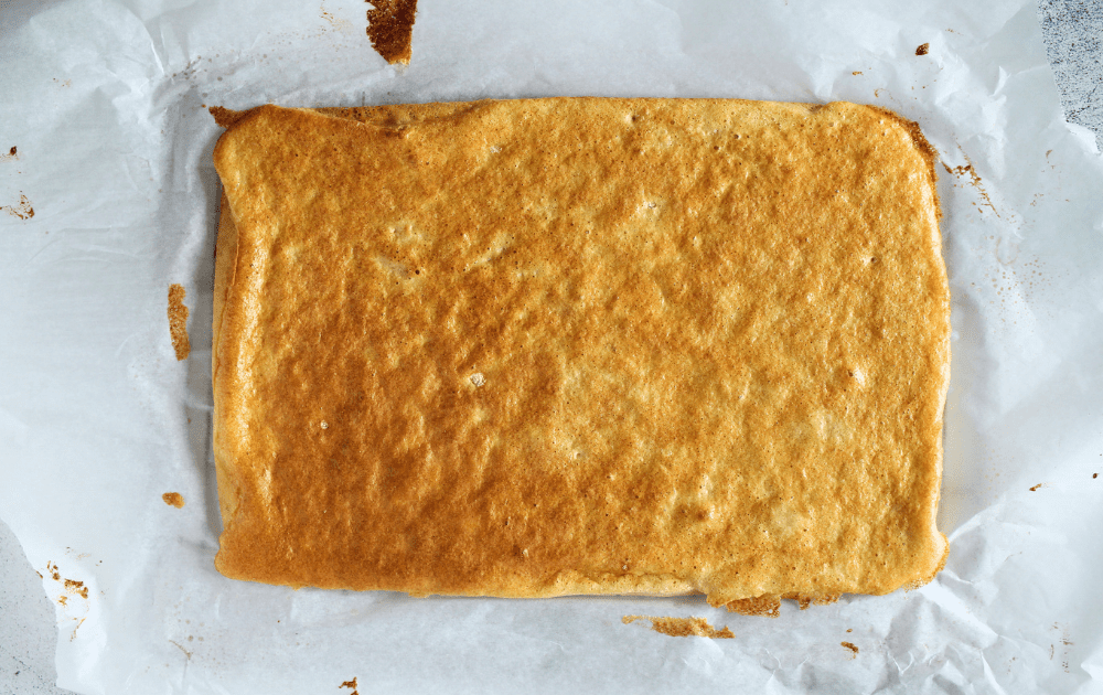 a sugar-free sponge cake drenched in sugar-free coffee before assembling into a keto tiramisu