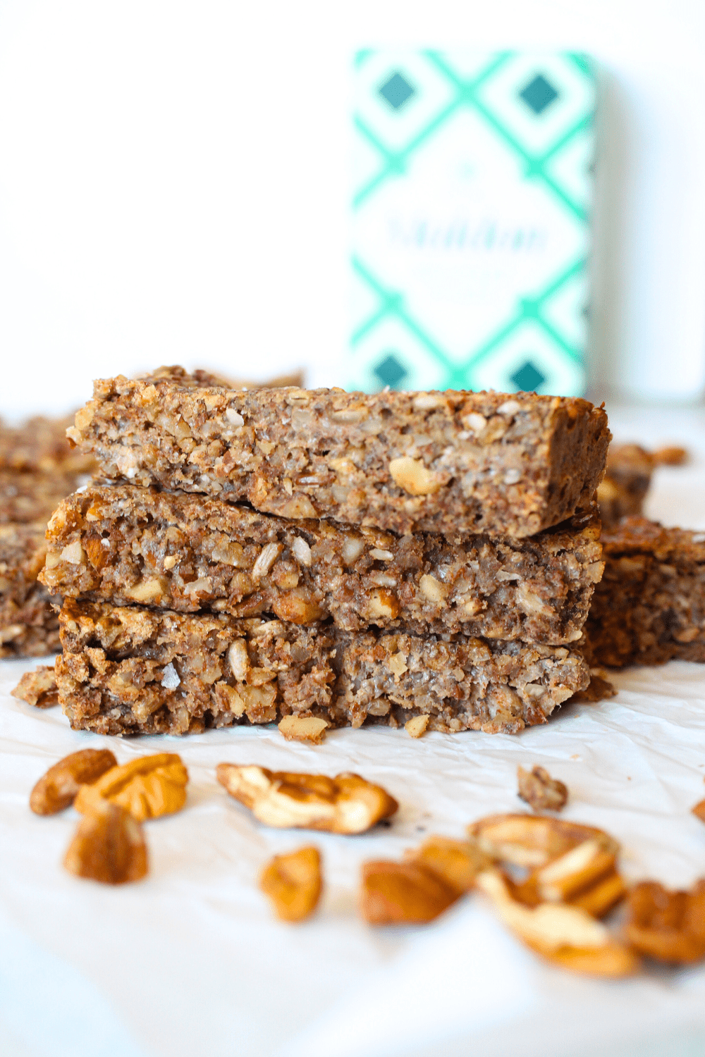 front view of 3 homemade healthy keto granola bars stacked on top of each other.