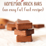 homemade fat fast bar that are shelf stable in chocolate flavour stacked on top of each other