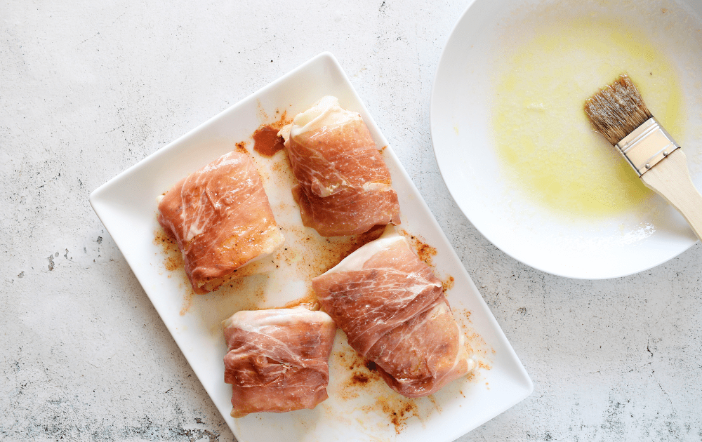 PSMF cod recipe that has been wrapped in prosciutto before being baked in an air fryer