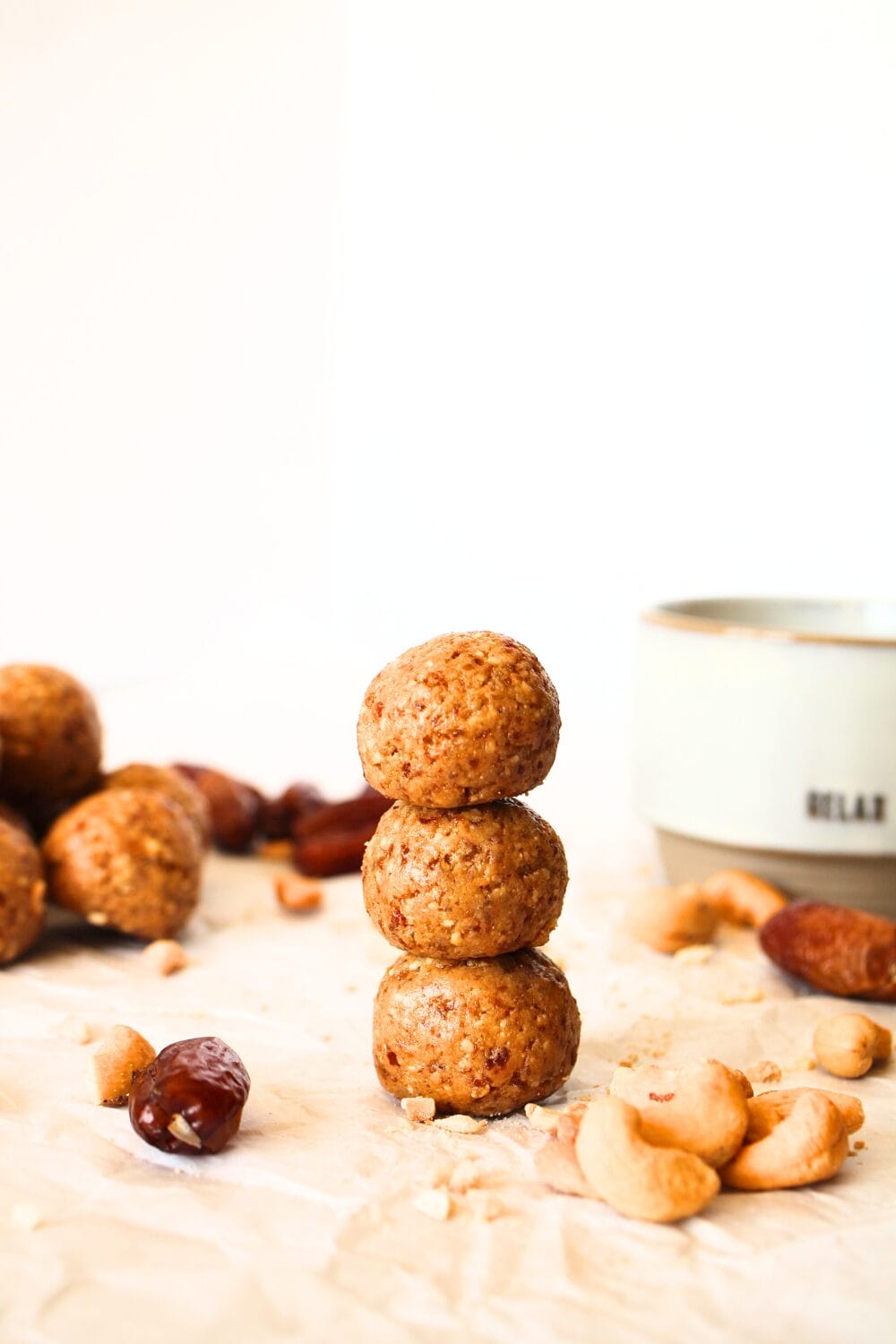 3 easy cashew cookie bites stacked on top of each other.