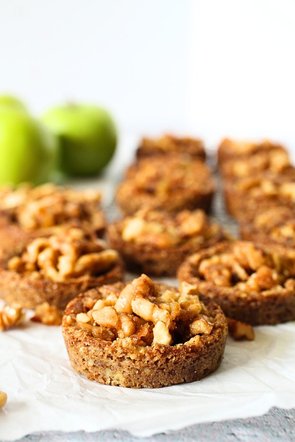 front view of mini keto apple pies with nuts