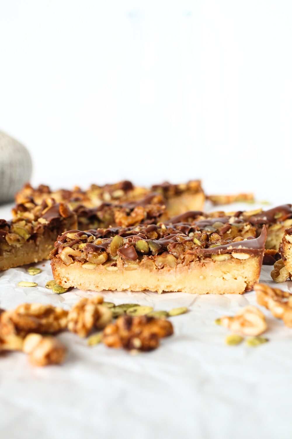 easy keto holiday cookie recipe combining shortbread base with nuts and seeds on top