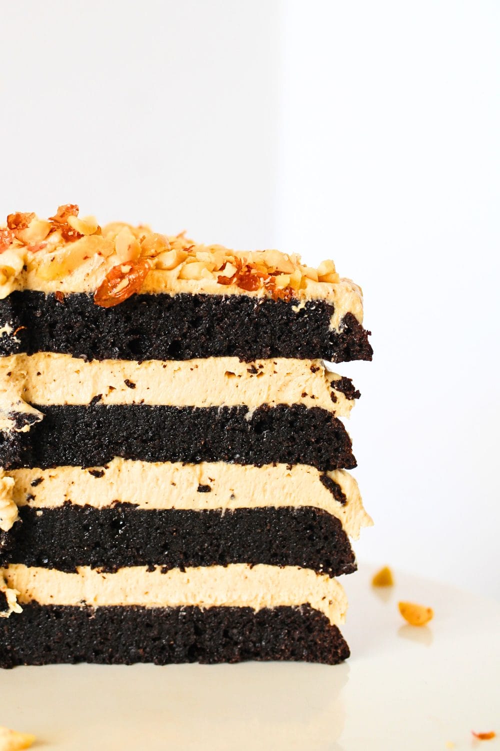 front view of low carb chocolate cake with peanut butter frosting between layers of cake