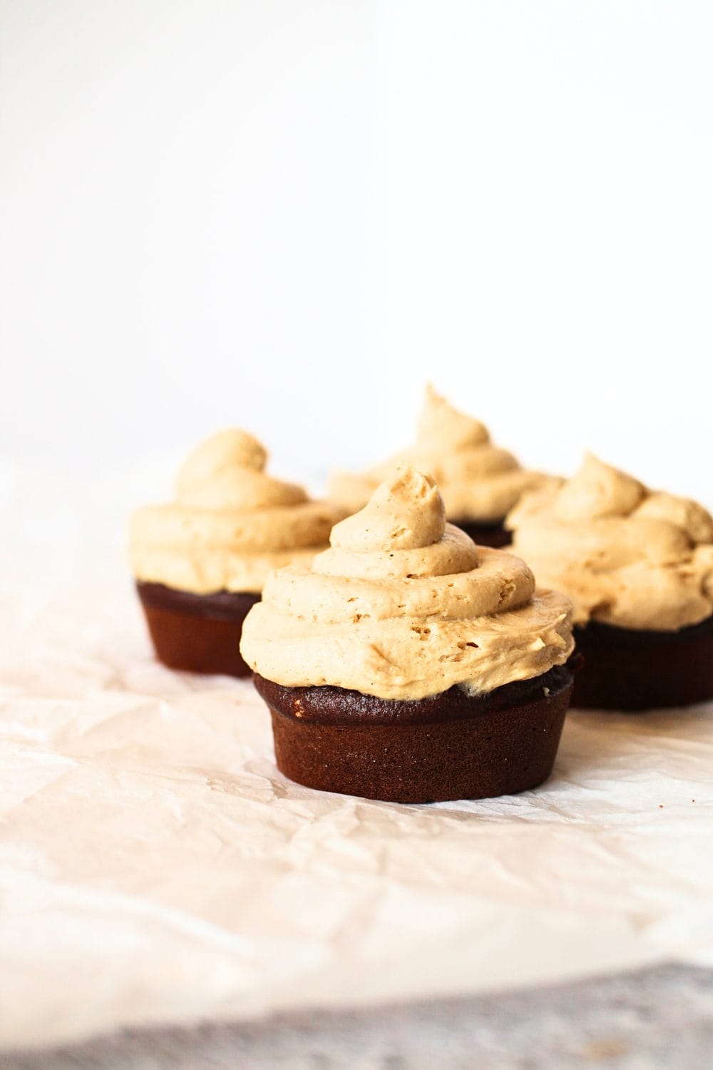 front view of high protein cupcake with high protein collagen frosting on top