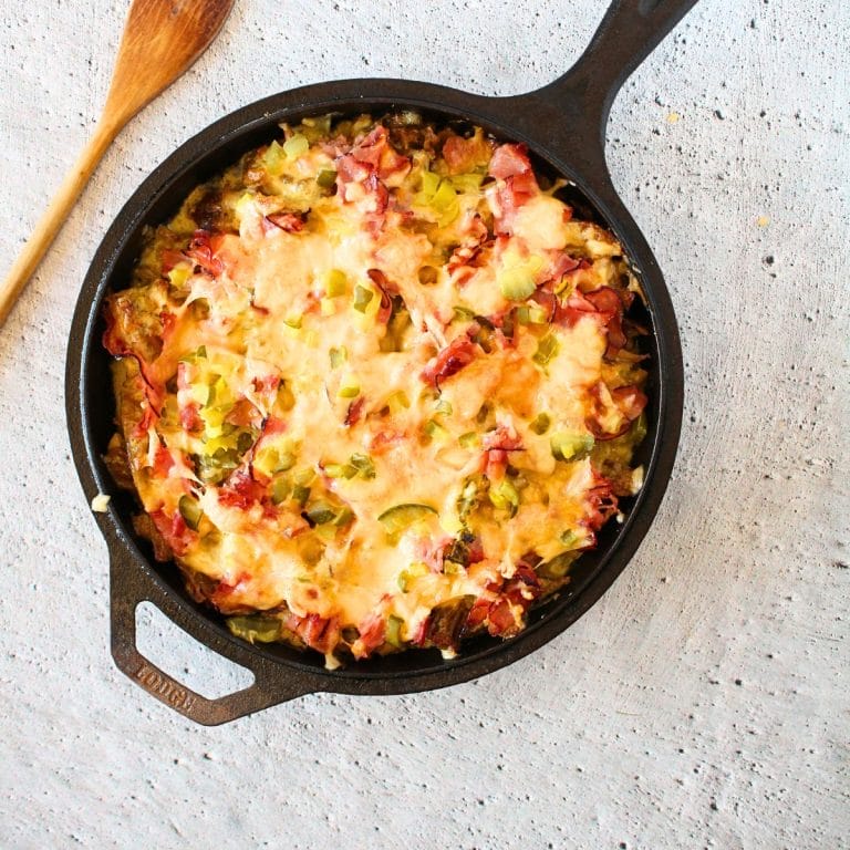 carnivore Cuban casserole after being baked in the oven with a wooden serving spoon
