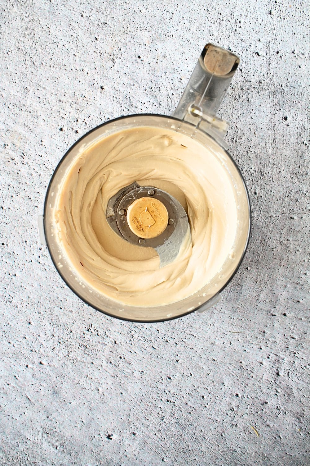 top view of food processor with pureed firm tofu