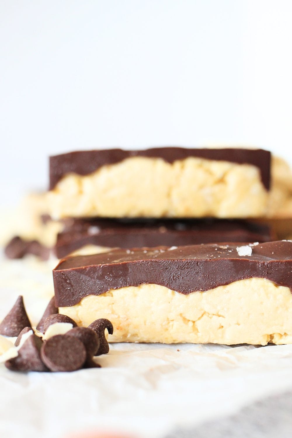 side vies of homemade keto protein bar with chocolate on top
