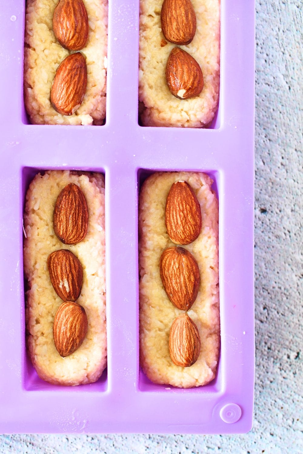 top view of keto coconut almond bar in protein bar mold