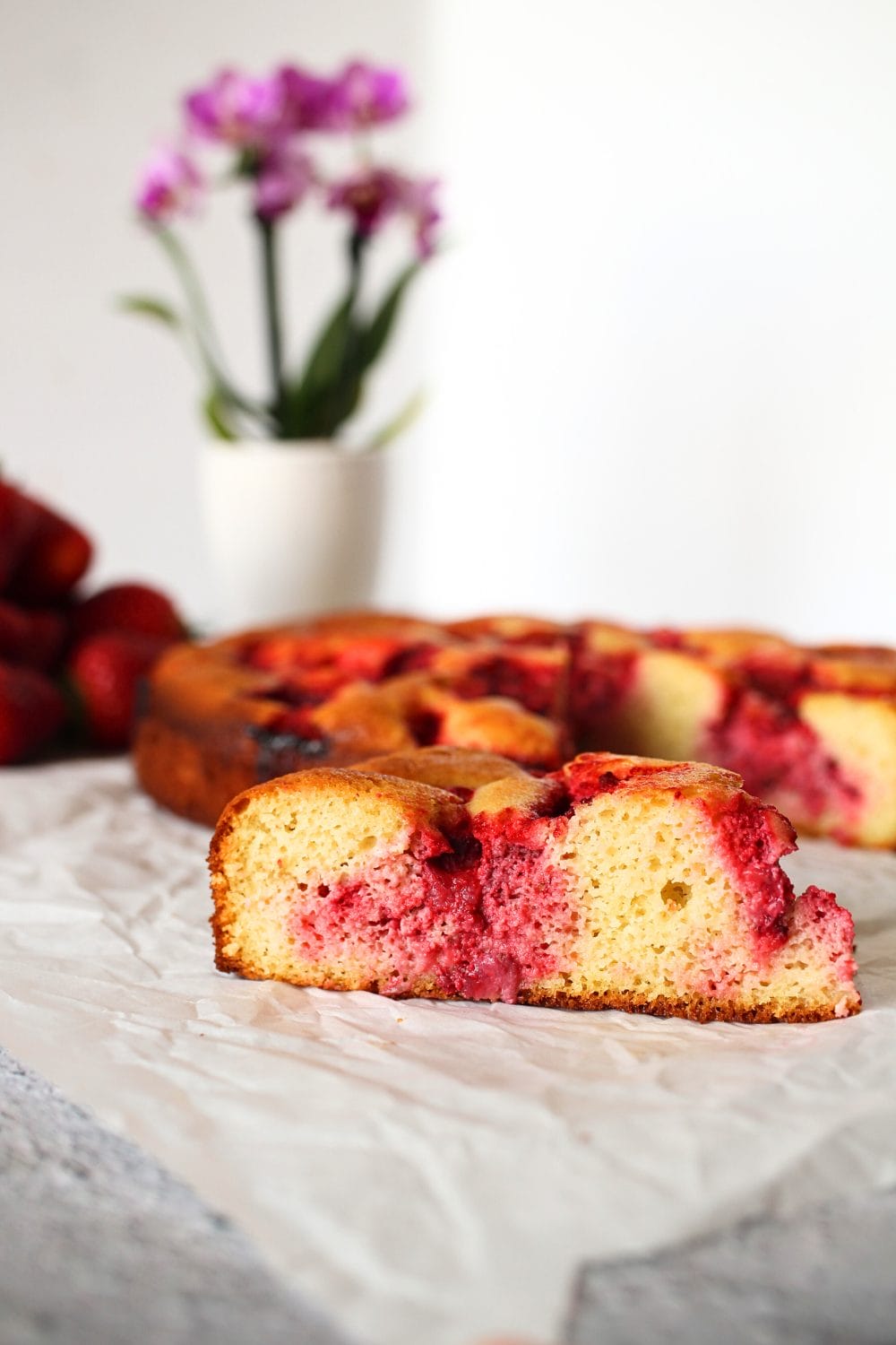 a slice of a keto dessert made with strawberries and gluten-free cake
