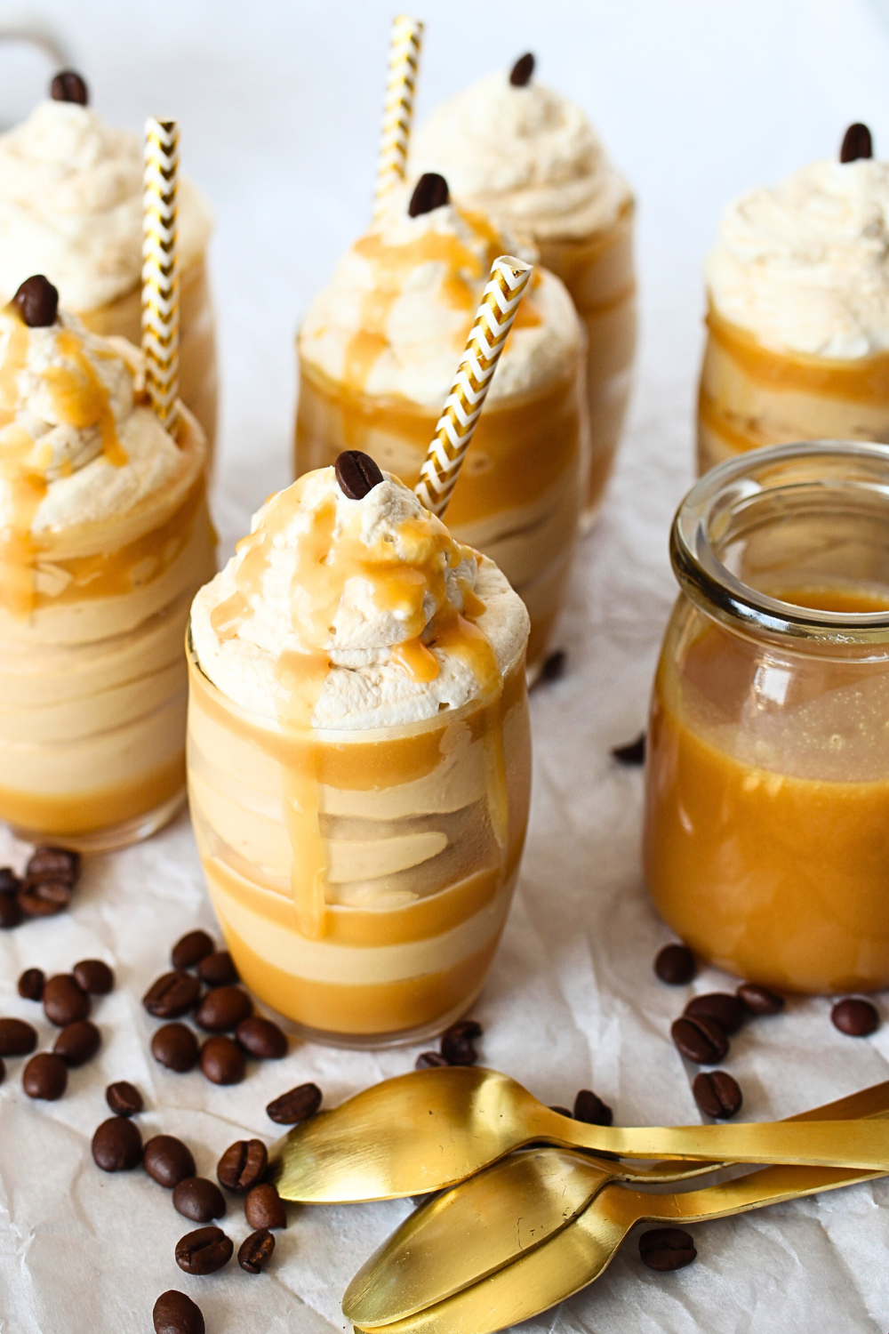 keto caramel macchiato cups with sugar-free whipped cream and sugar-free caramel drizzle