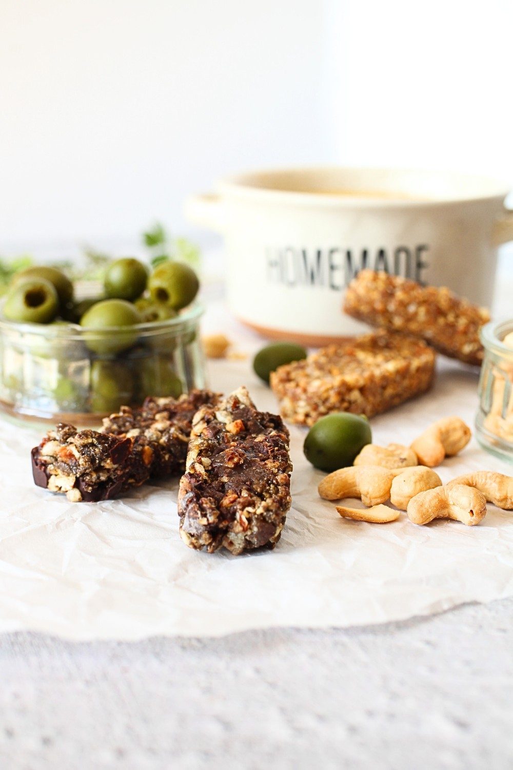 front view of DIY Prolon alternative with soup, bars, cashews and olives