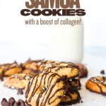 keto collagen cookies drizzled in sugar-free chocolate with additional sugar-free chocolate chips scattered about