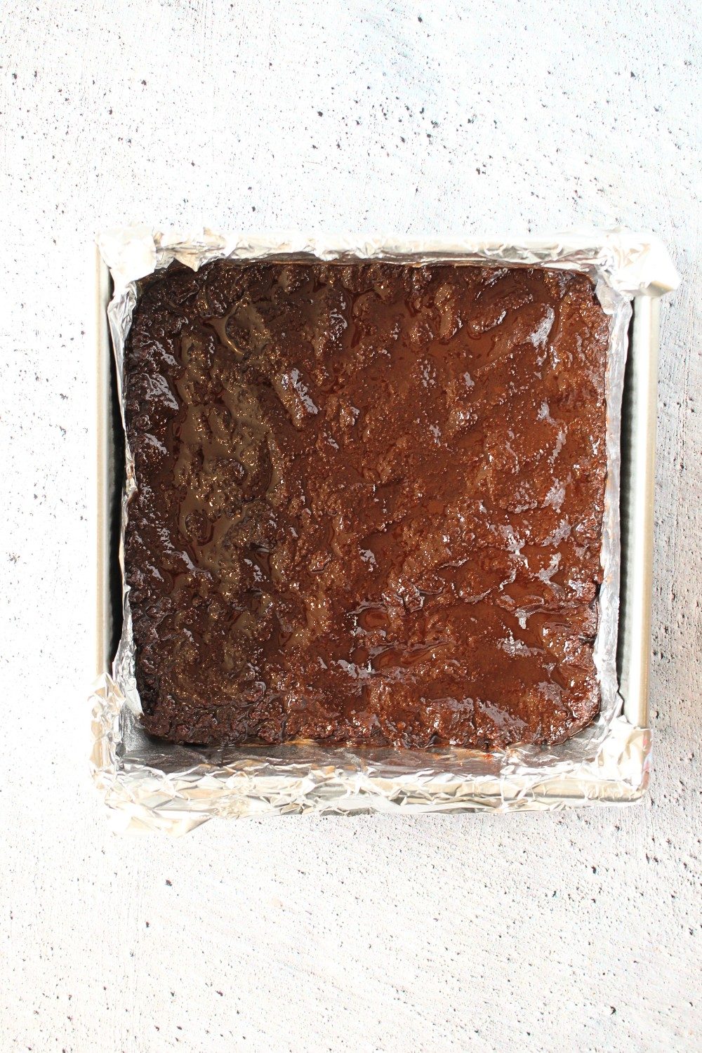 keto cheesecake brownies recipe with showing the brownie base