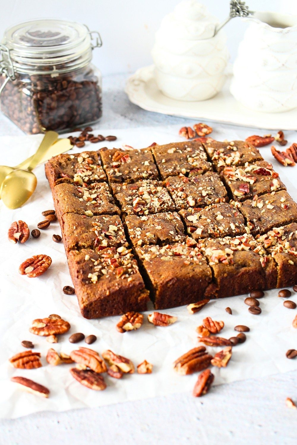 high fiber blondies cut into 16 squares with nuts and espresso beans