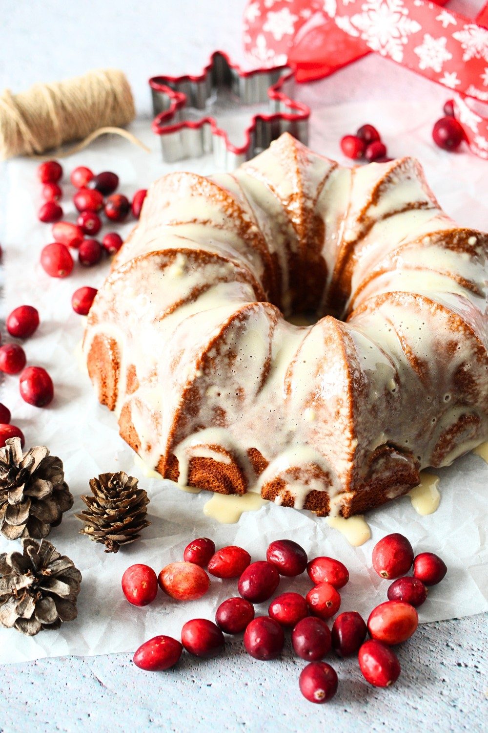 front view of keto holiday bundt cake with fresh cranberries