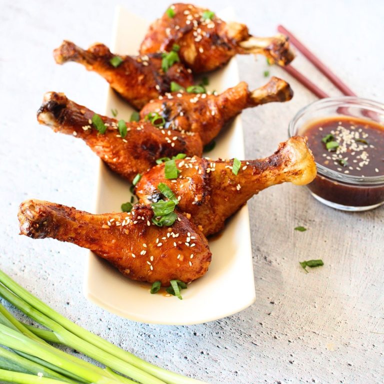 keto baked sweet and sour drumsticks with sesame seeds and green onions