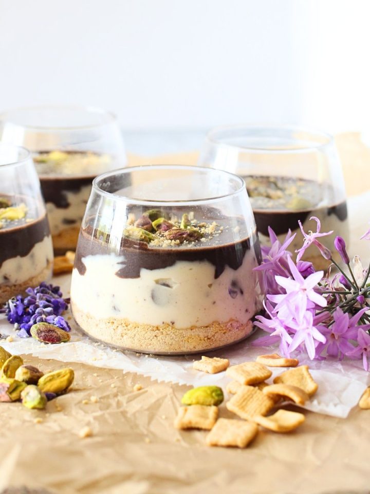 high protein mini cannoli cheesecake cups with pistachios on top